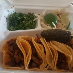 Tacos al pastor. Comes with borracho beans.