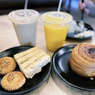 Chocolate croissant, date cookies, mango smoothie, iced Quamaria latte