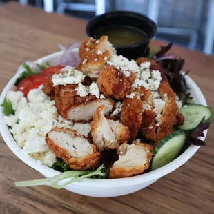 a bowl of chicken and rice salad