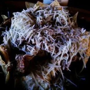 Pulled pork 3 cheese nachos.