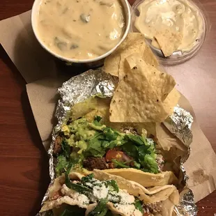 Queso, chips, gladiator taco, and two timer taco