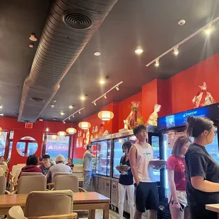 a group of people in a restaurant