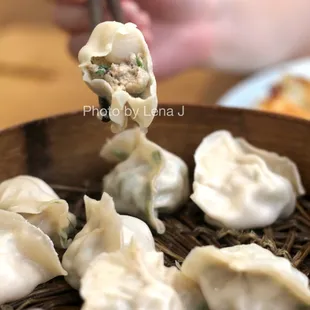 Inside of Scallops Kurobuta Pork and Lotus Steamed Dumplings 干贝莲藕水饺 ($23.99) - great! Really juicy.