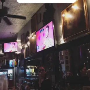 a view of a restaurant with a ceiling fan