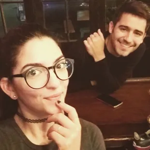 a man and a woman sitting at a table