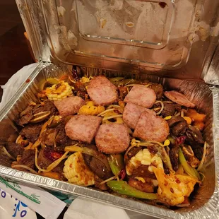 Beef and ribs, added spam and corn.