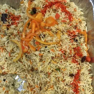 a dish of rice and vegetables