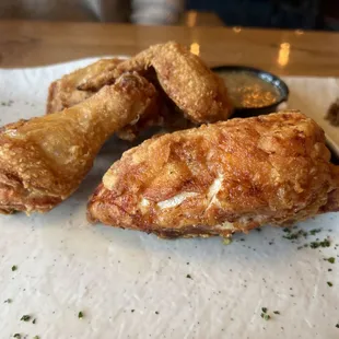 Half Broasted Chicken with greek sauce on side
