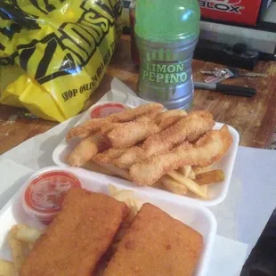 two trays of fish and chips