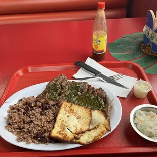 a plate of food on a red tray