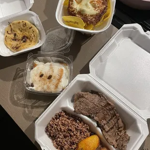 Carne asada with gallo pinto and maduro frito, tajadas con queso, pupusa revuelta, y Pío V