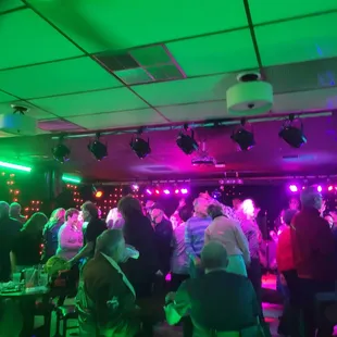a crowd of people dancing