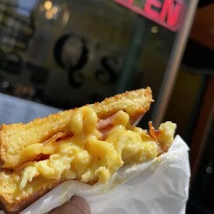 Breakfast Sandwich (Fresh Fluffy Scrambled Eggs, Crispy Bacon, Tomatoes, with our special Hollandaise Sauce on Texas Toast)