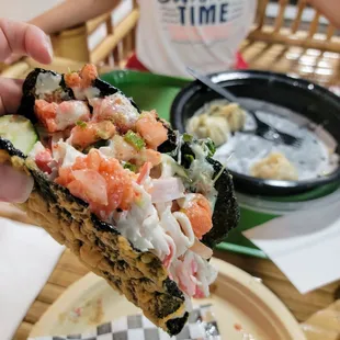 Maui Wowie nothing to wow at all, 10 bucks with all the rice and imitation crab+bland.