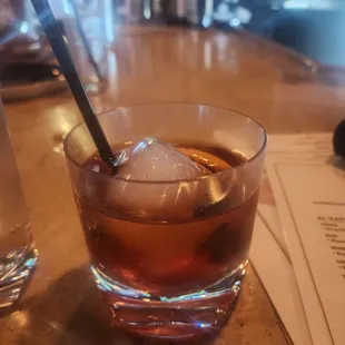 a drink with ice in a glass