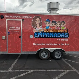a food truck in a parking lot