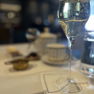 a glass of water on a table