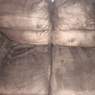 the after, this is a very old microfiber couch but looks great to be as old, major stains gone