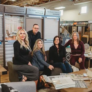 a group of people sitting on a couch