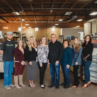 a group of people standing in a store