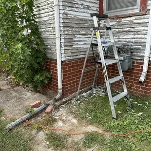 a ladder leaning against a house