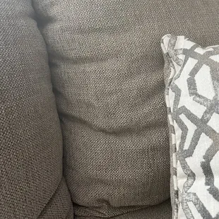This shows the side that is done right, and the other side where you can see the cushions were not full.