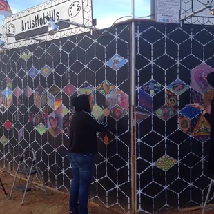 QFS own cuisine creator,Ms Vicky, exploring her artistic side at Further Future 3016