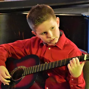 Quality Music and Dance Guitar Student