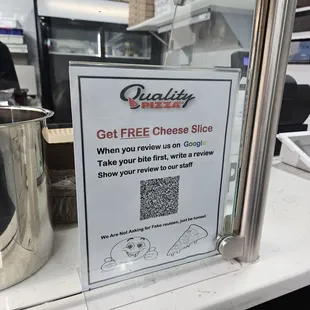 a sign for a cheese slice