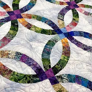 Rapunzel Quilting on a Wedding Ring Quilt