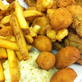 Sampler platter: flounder, shrimp, oysters, scallops, hush puppies, coleslaw &amp; fries