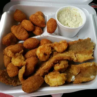 Trout and shrimp dinner with double hush puppies. Best seafood ever!