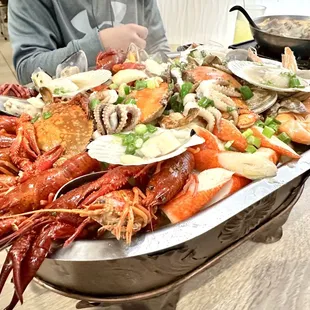 LARGE SEAFOOD COMBO ,its big and so packed of Seafood ! Yummm ! Make sure to order lots of rice to eat with it :)