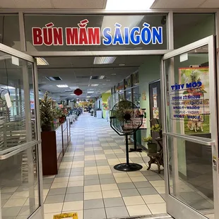 Go down this hall way, at the end you'll find Quan Ca Saigon