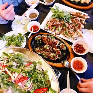 Steamed squid, grilled clams, OC mong tay.