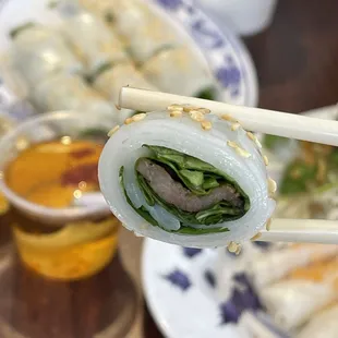 a plate of food and chopsticks