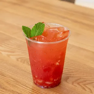 Mango lychee green tea made with fresh fruit puree, made in house!