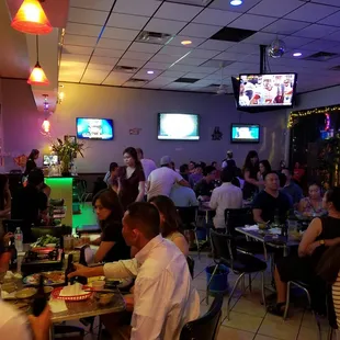 a large group of people in a restaurant