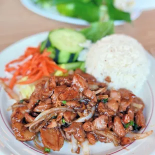 a plate of chicken and rice