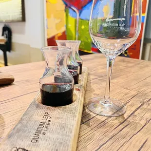 a glass of wine and a bottle of wine