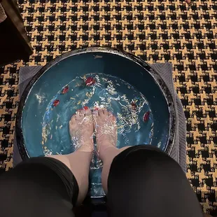 feet in a bowl of water
