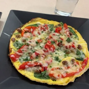 Sausage, pepper, spinach, and cheese omelette