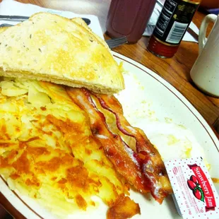 a plate of breakfast food on a table