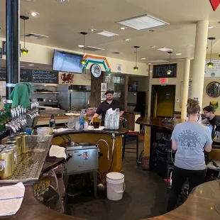 a man and a woman in a kitchen