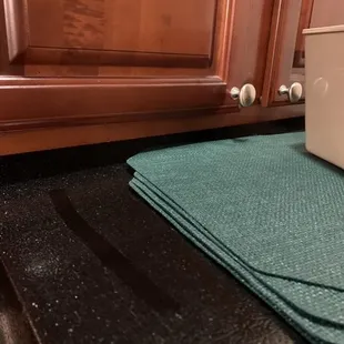 Pile of dust on top of fridge