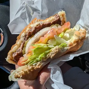 Giant burger - sorry, couldn't wait to dig in. Halfway through!