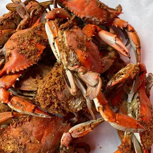 a pile of crabs on a table