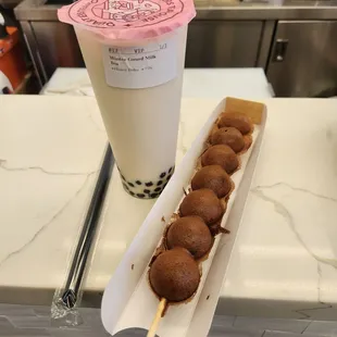 Winter gourd milk tea with honey boba and double chocolate egg puffs skewer