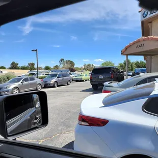 CARS AND MORE CARS WAITING FOR SERVICE