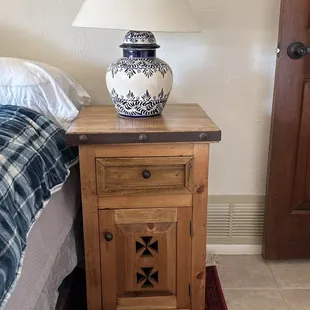 Nightstand and lamp. So much character!